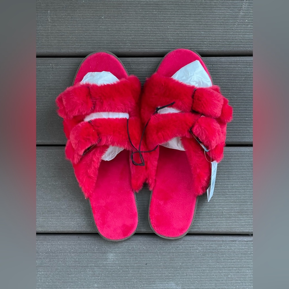 Red, fluffy LOFT slippers.